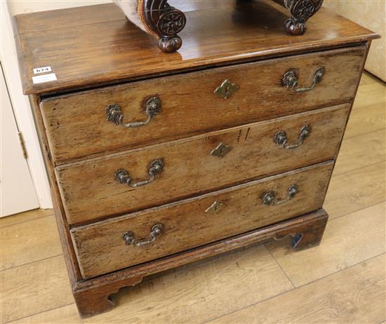 An 18th century style oak chest of three drawers, W.78cm